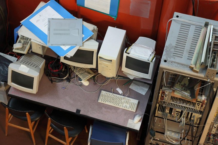 Table with multiple computer monitors.